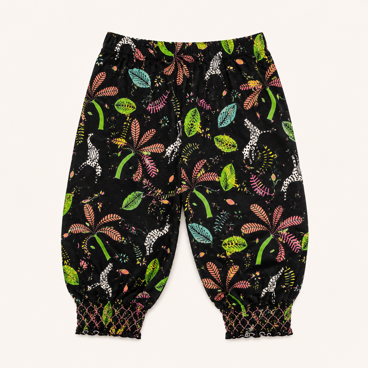 Pantalon sarouel noir fluide à imprimé jungle et bas smoqués – Orchestra