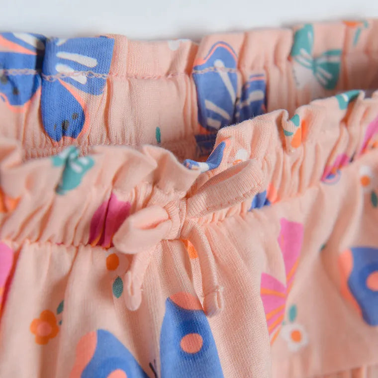 Jupe pêche à motifs papillon -