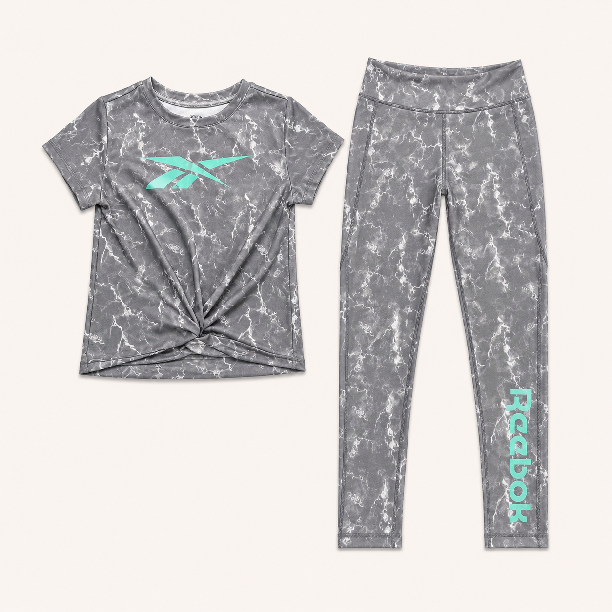 Ensemble de Sport Fille Reebok – T-shirt Torsadé et Legging Effet Marbre Gris