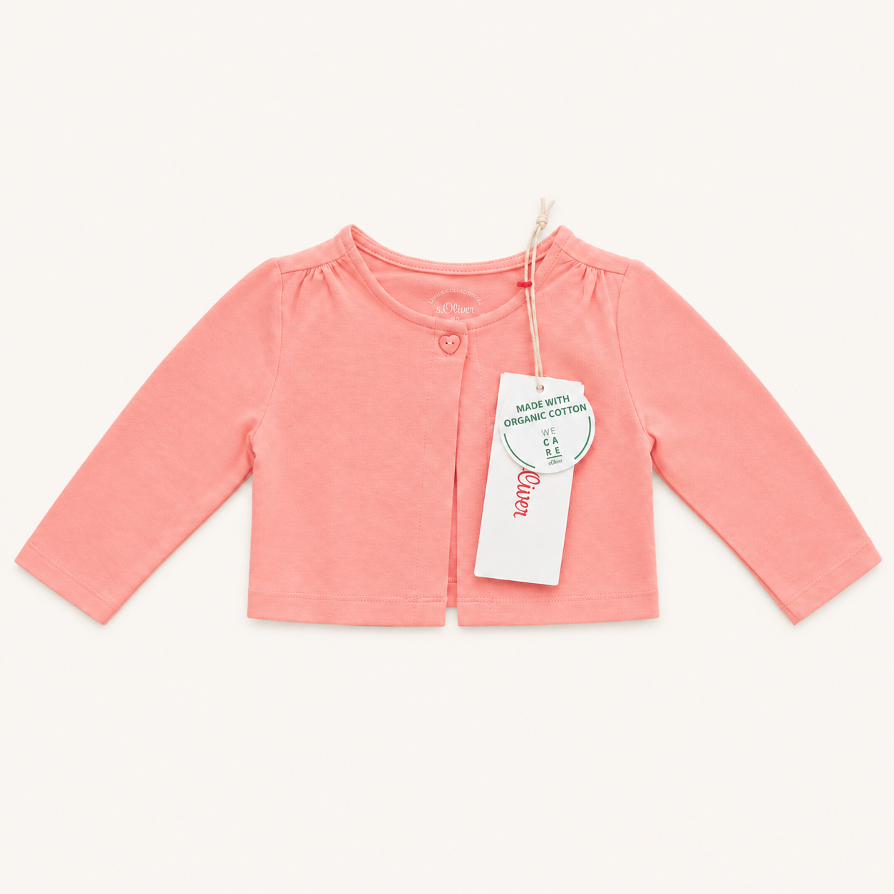 Cardigan en tricot rose doux