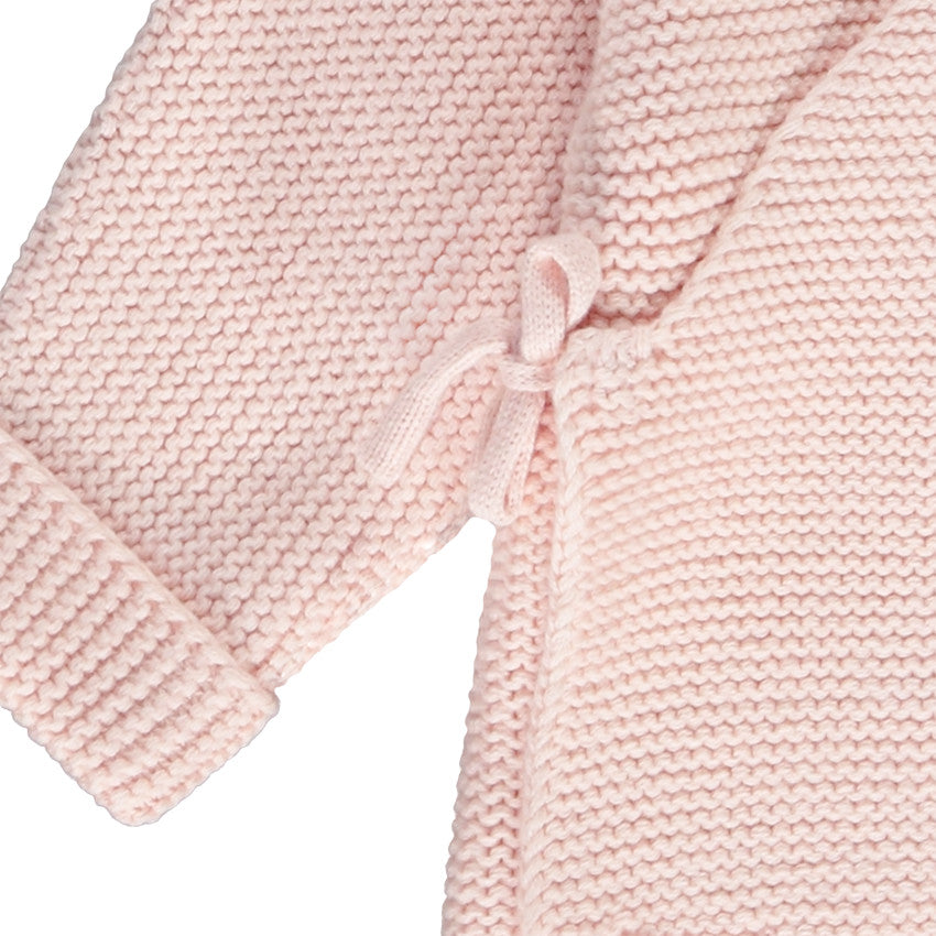 Gilet en tricot rose pâle